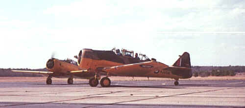 Harvard Two-Ship taxis out for takeoff.