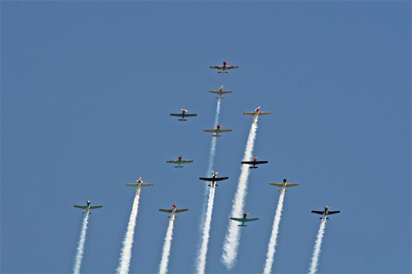 Yaks and CJ-6s in formation, Copyright 2011 WarbirdAlley.com