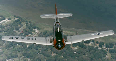 T-6D over coastline