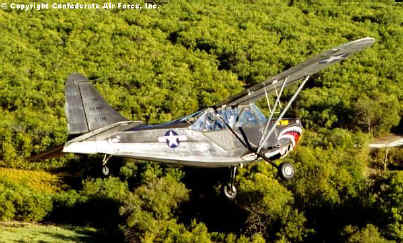 L-5 banks over the trees.